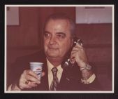 Dr. Jenkins holding a Pepsi-Cola cup